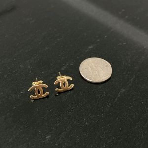 Chanel logo earings in 14k solid gold